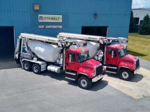 2 mixer-mounted rotabelt conveyors ready for pick up at Rotabelt Factory